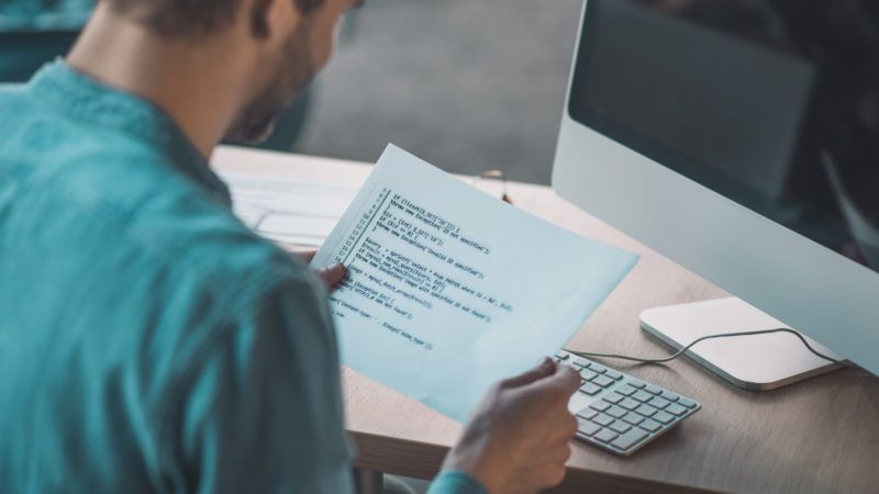 close up of a nice young man reading the code 2021 09 04 04 22 31 utc 800x450 1